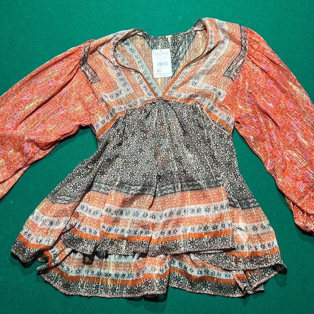 Free people flared top with tags